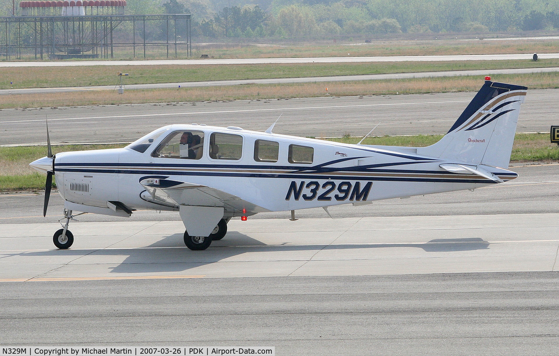 N329M, Raytheon Aircraft Company A36 Bonanza C/N E-3490, Taxing to Epps Air Service