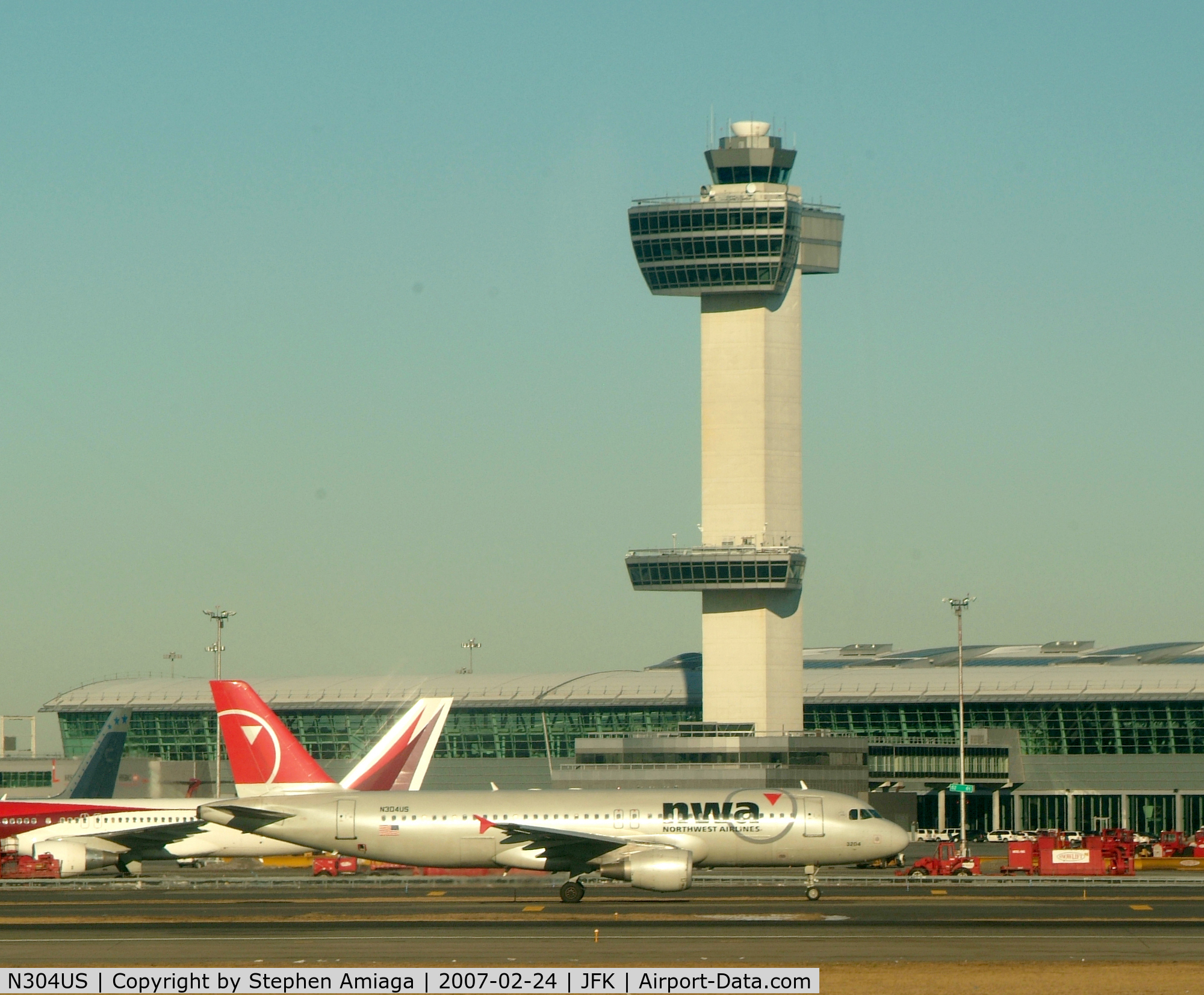 N304US, 1989 Airbus A320-211 C/N 040, Here we go... Tower and Terminal 4 IAT behind