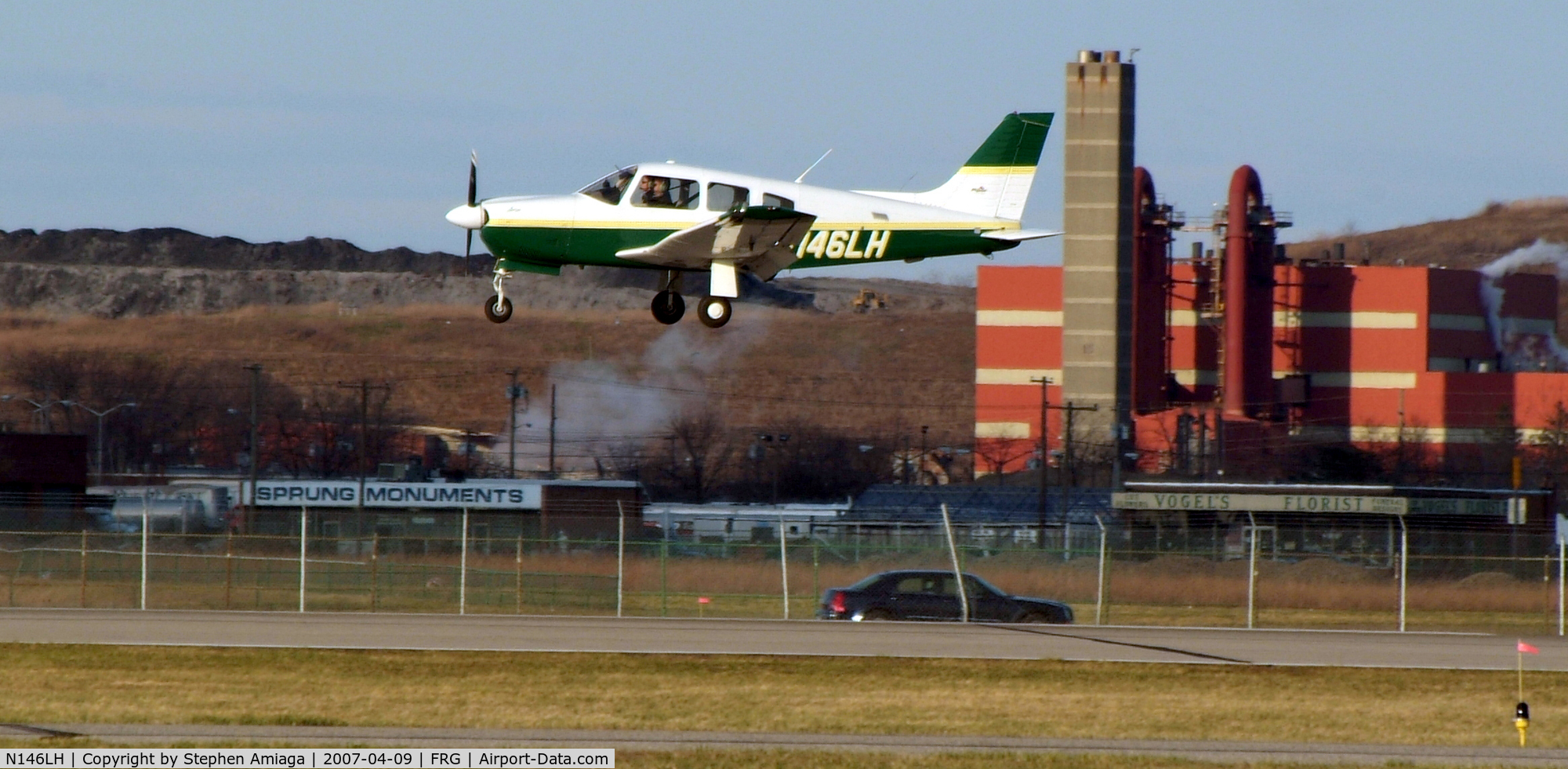 N146LH, 2003 Piper PA-28R-201 Cherokee Arrow III C/N 2844102, Farmingdale State Arrow about to touch down