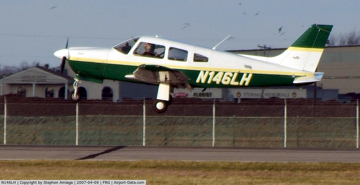 N146LH, 2003 Piper PA-28R-201 Cherokee Arrow III C/N 2844102, Arrow in the flare...