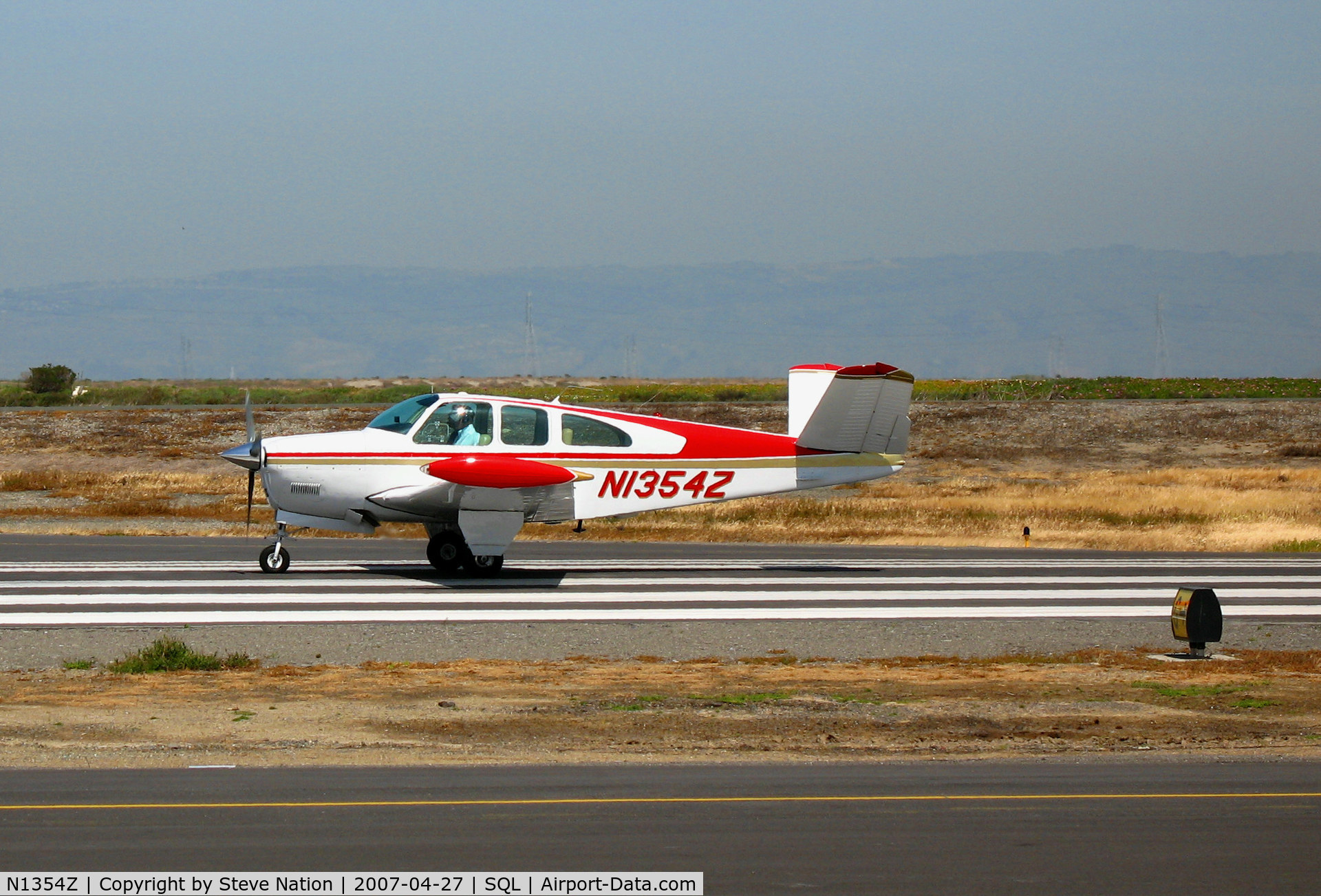 N1354Z, 1961 Beech N35 Bonanza C/N D-6774, 1961 Beech N35 beginning take-off run @ San Carlos, CA