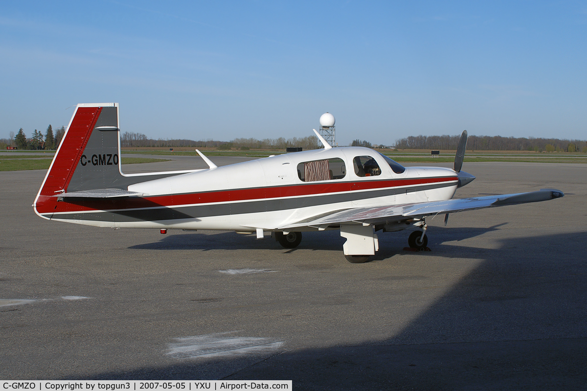 C-GMZO, 1987 Mooney M20J 201 C/N 24-3023, Parked at ESSO ramp.