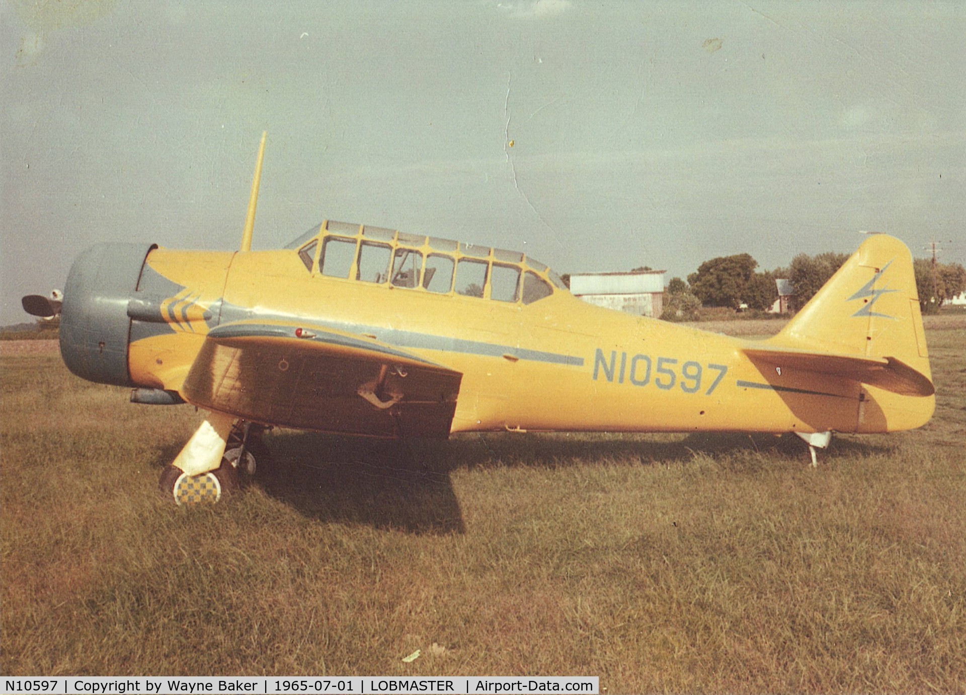 N10597, 1957 North American AT-6C Texan C/N 88-13364, Harold Baker'sSNJ-4 at Lobemaser Field circa 1965