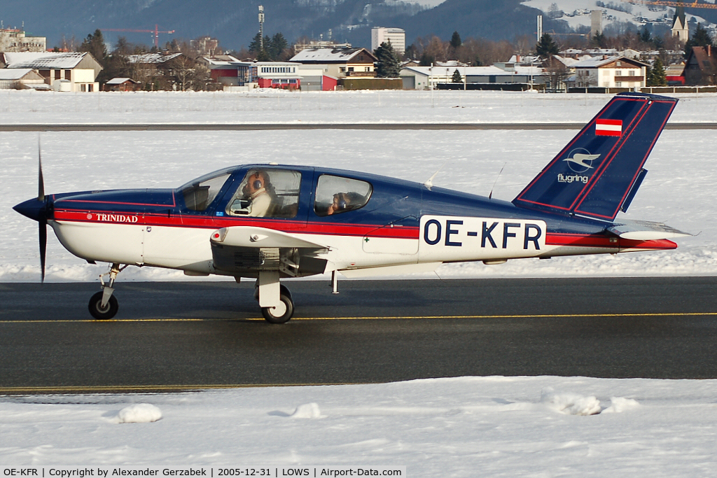 OE-KFR, Socata TB-20 Trinidad C/N 1340, taxiing to rwy 16 in the nice winter landscape of Salzburg