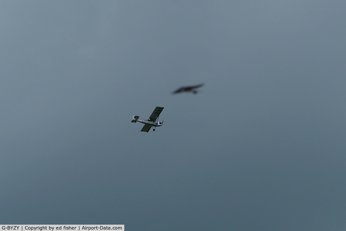G-BYZY, 2000 Pietenpol Air Camper C/N PFA 047-12190, close up of near miss with ufo (or ghost inverted spitfire???)