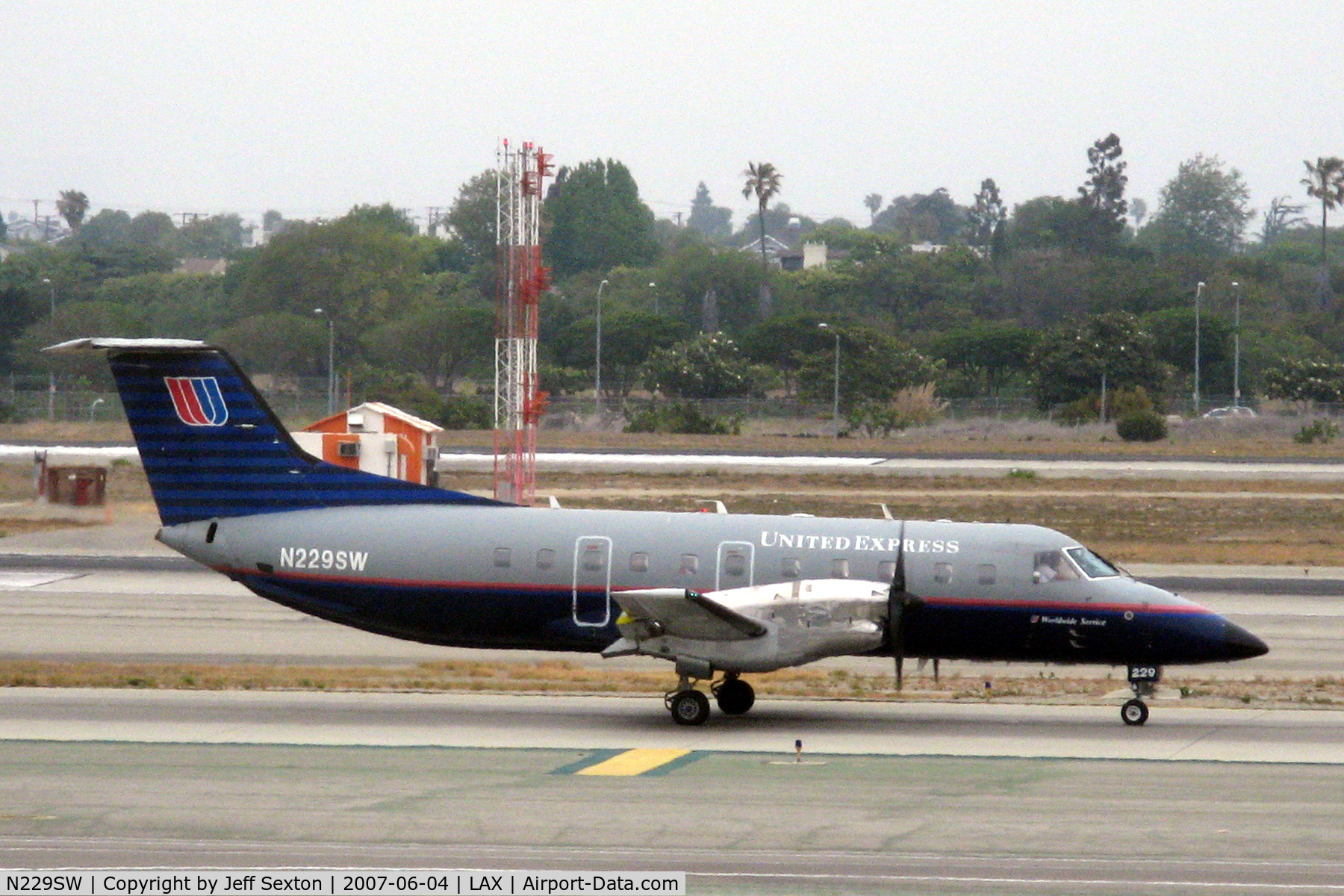 N229SW, 1995 Embraer EMB-120ER Brasilia C/N 120.305, Awaiting clearance at LAX