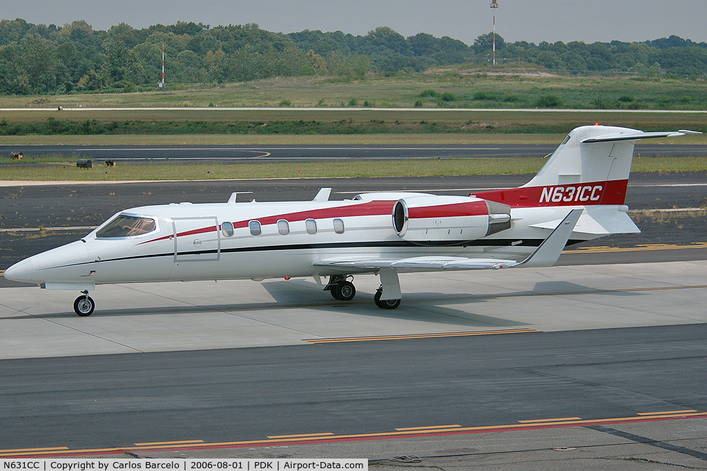 N631CC, 1995 Learjet Inc 31A C/N 104, Passing by the observation deck at PDK.