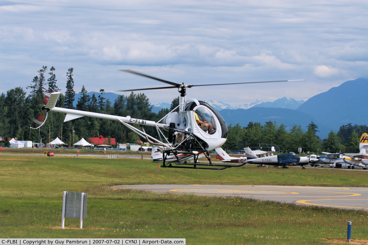 C-FLBI, 2006 Schweizer 269C-1 C/N 0264, Side view.  Isn't that the cutest thing you ever did see