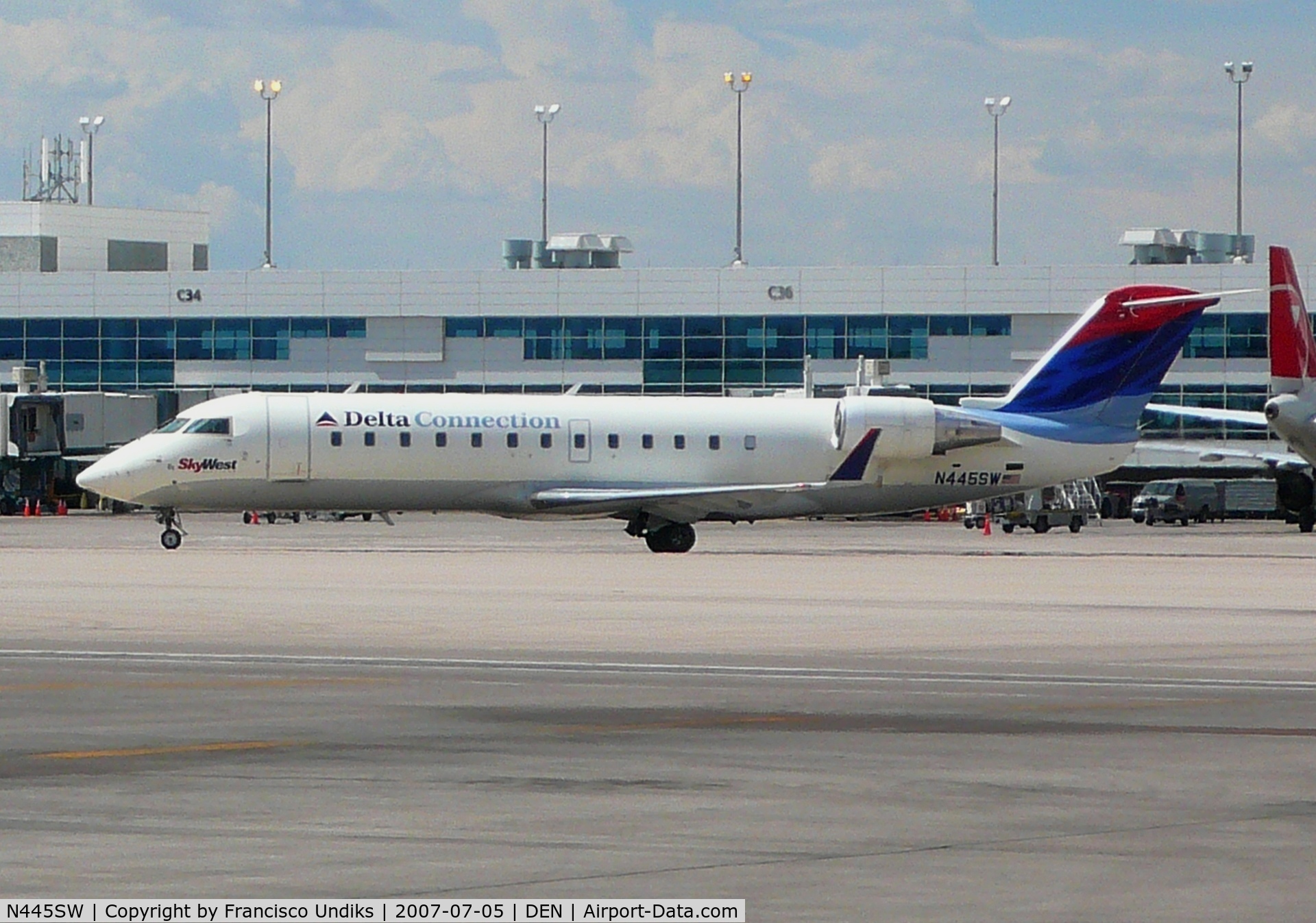 N445SW, 2002 Bombardier CRJ-200LR (CL-600-2B19) C/N 7651, Taxiing to Bravo November.