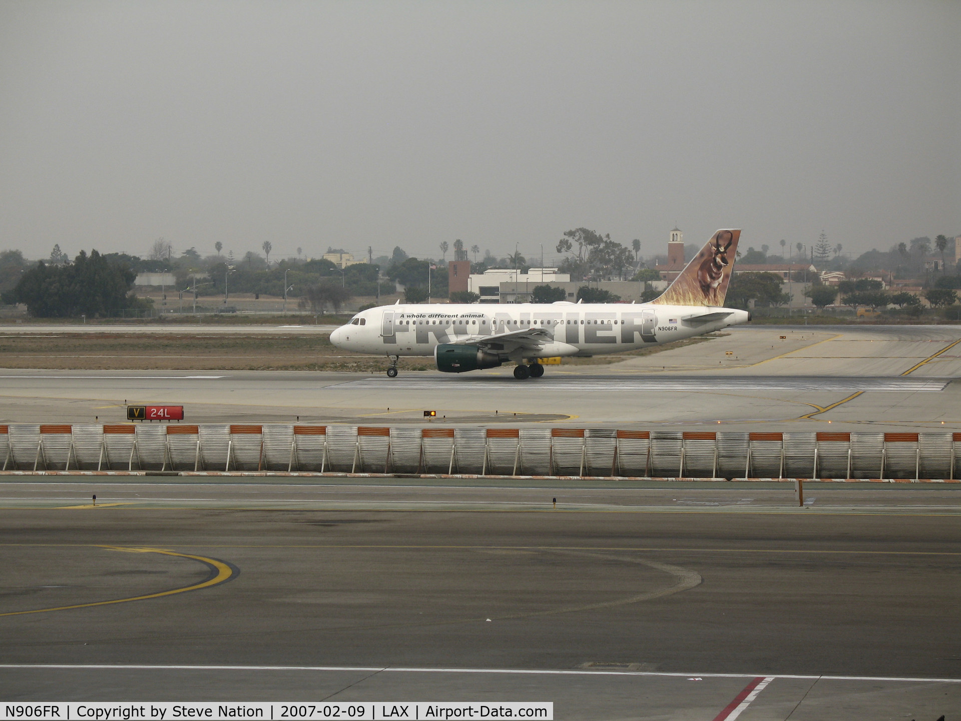 N906FR, 2002 Airbus A319-111 C/N 1684, Frontier A319-111 with Elk on tail rolling @ LAX