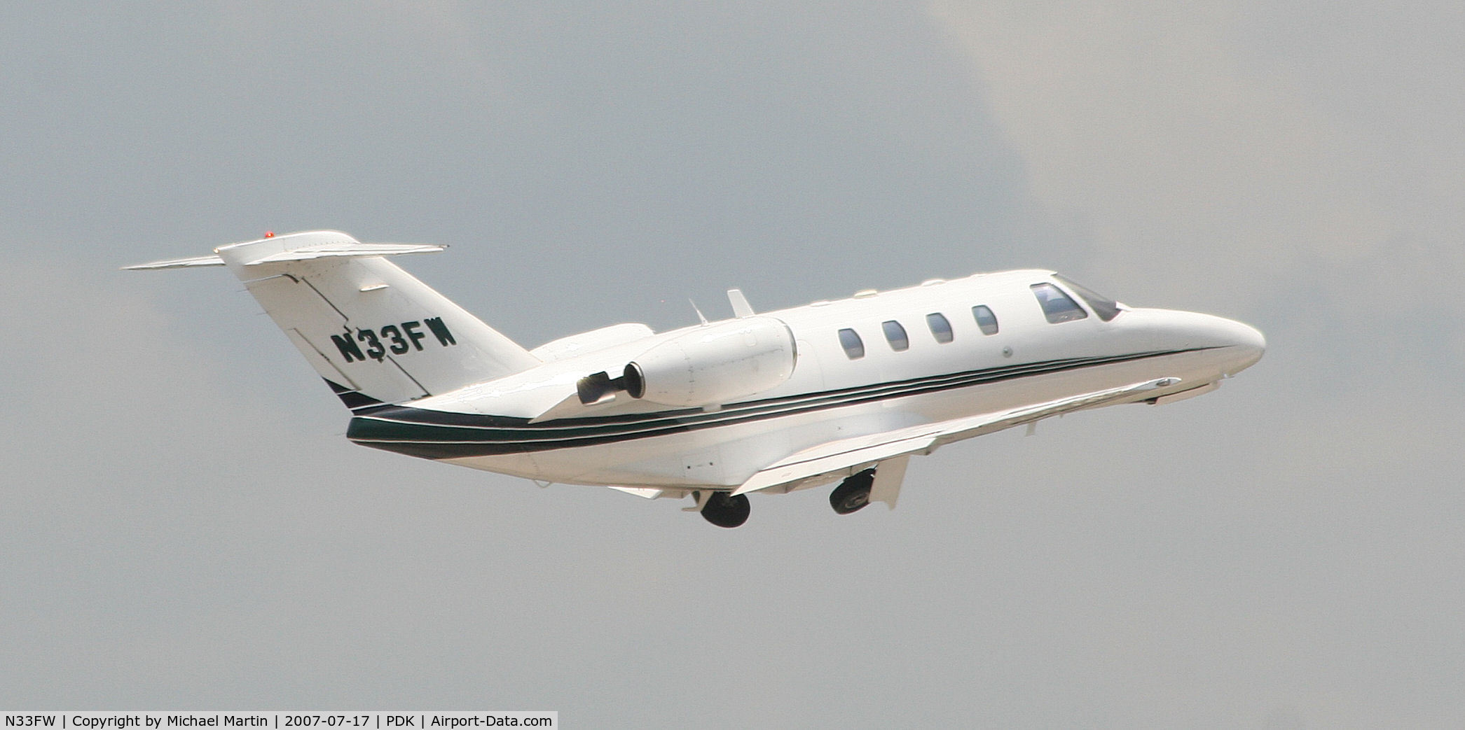 N33FW, 1997 Cessna 525 CitationJet CJ1 C/N 525-0203, Departing PDK enroute to IND