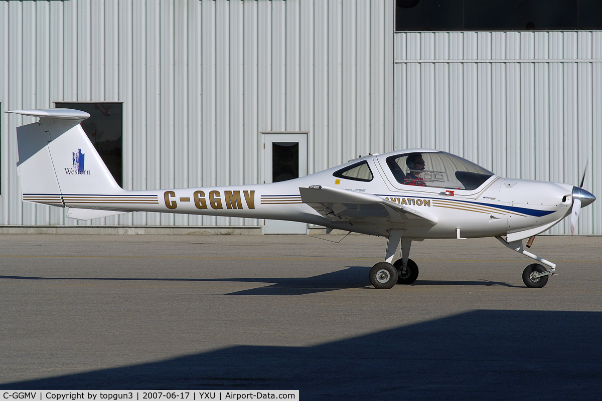 C-GGMV, 2003 Diamond DA-20C-1 Eclipse C/N C0231, Taxiing across Ramp III.