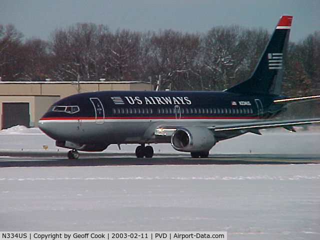 N334US, 1985 Boeing 737-301 C/N 23231, Brrrr! Snow! N334US B737-300 with US Airways ready to depart PVD after a midwinter snowfall!