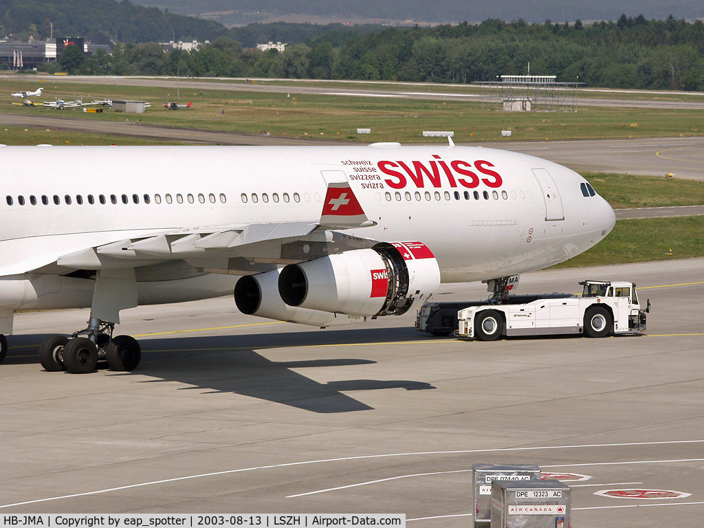 HB-JMA, 2003 Airbus A340-313 C/N 538, she ist towed to the gate