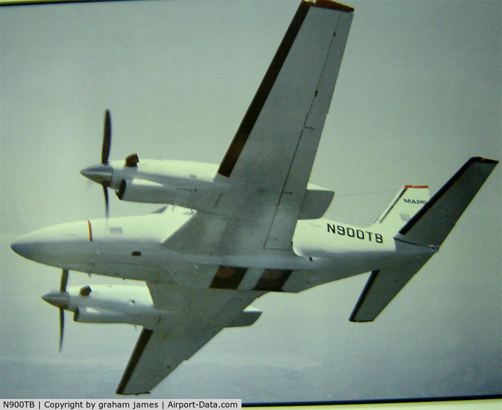 N900TB, 1974 Piper PA-31P Navajo C/N 31P-7400227, showing camera apertures