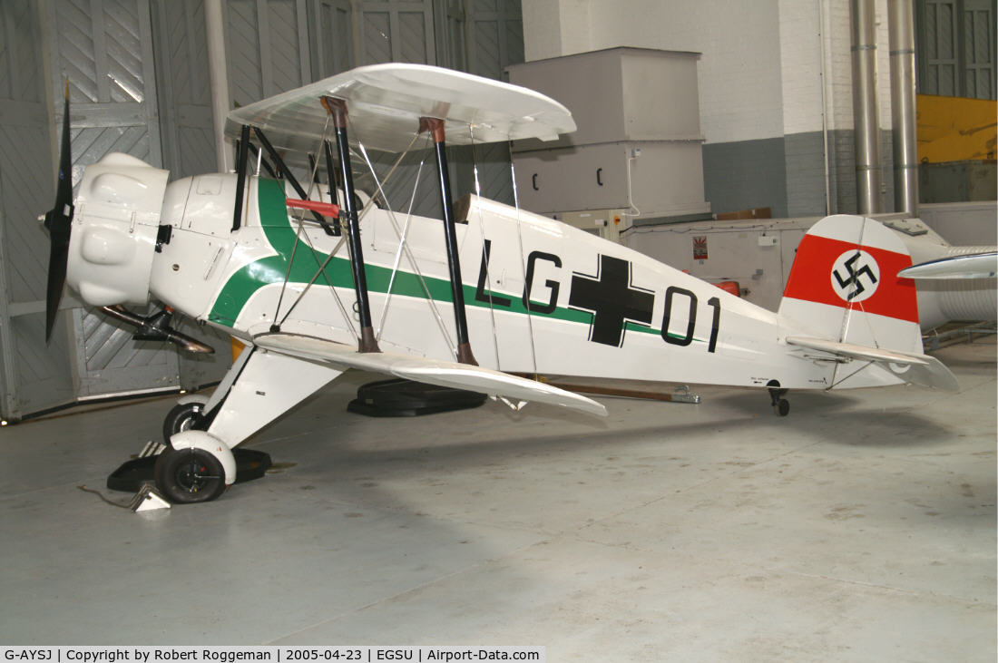 G-AYSJ, 1938 Bucker Bu-133C Jungmeister C/N 38, The Fighter Collection.Luftwaffe colors LG+01.