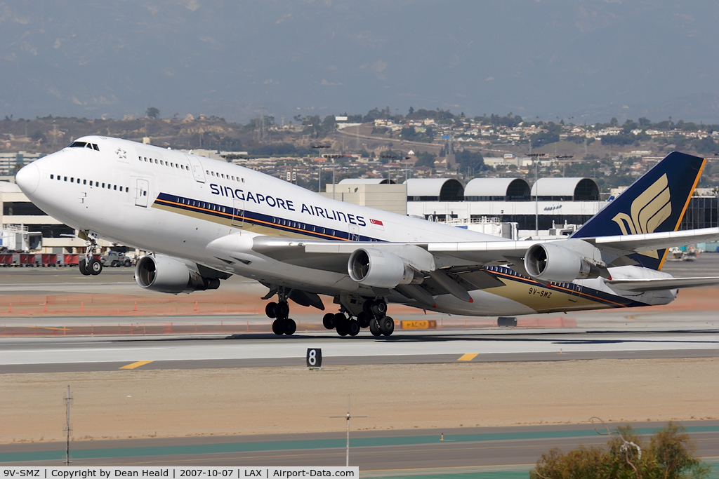 9V-SMZ, 1994 Boeing 747-412 C/N 26549, Singapore Airlines 9V-SMZ (FLT SIA11) departing RWY 25L enroute to Narita Int'l (RJAA).
