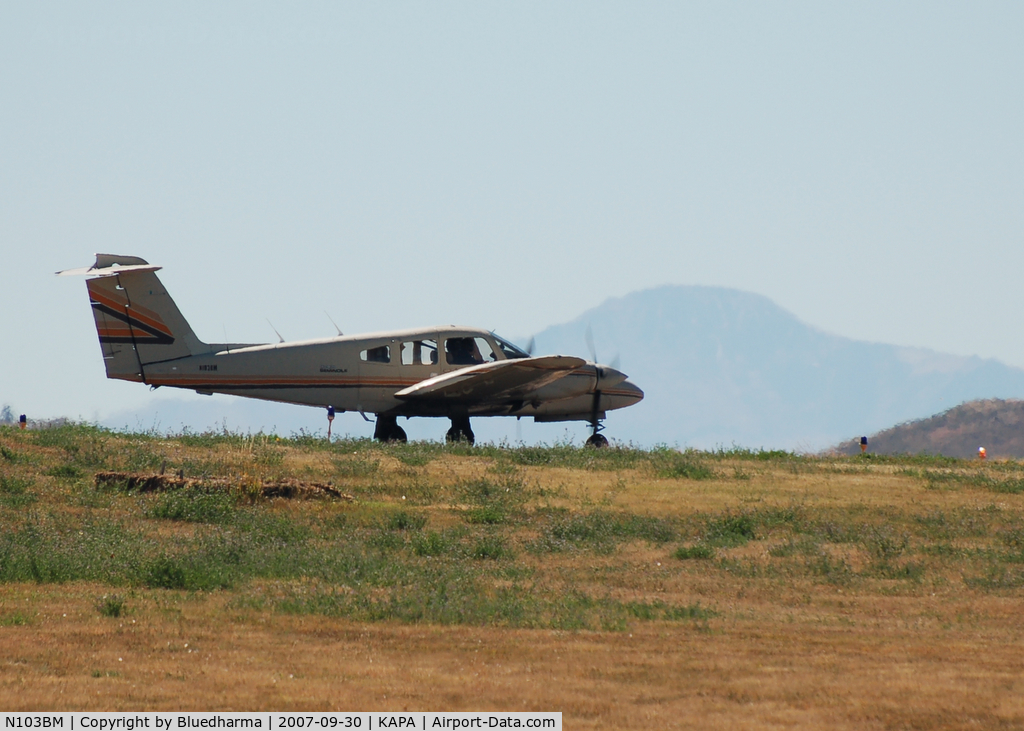 N103BM, 1980 Piper PA-44-180T Turbo Seminole C/N 44-8107007, Taxi to takeoff, Pike's Peak in the background.