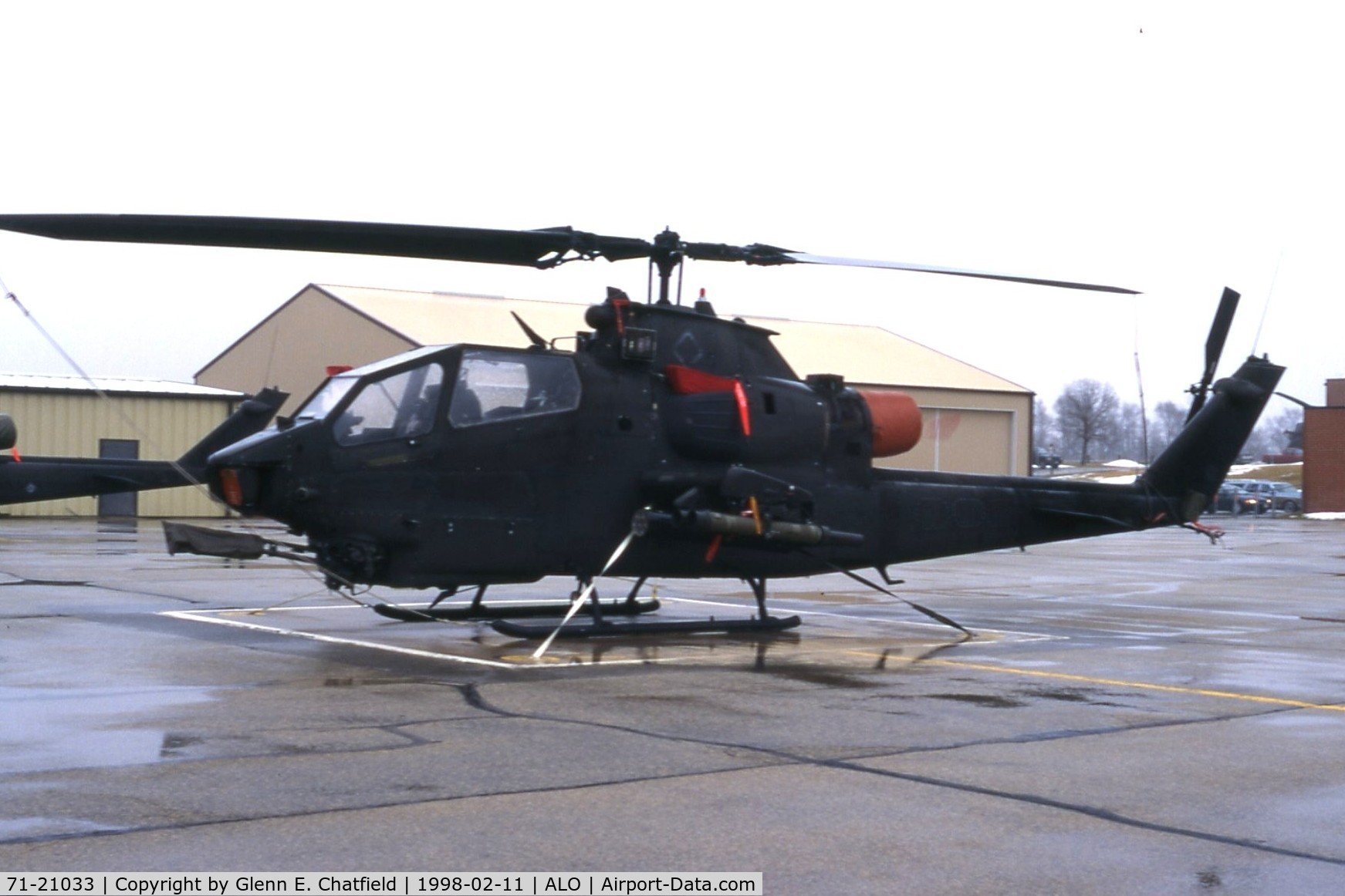 71-21033, 1971 Bell AH-1F Cobra C/N 21104, AH-1F of the Iowa National Guard, taken during freezing drizzle.  Now at a Veteran's Memorial in Henderson, NY
