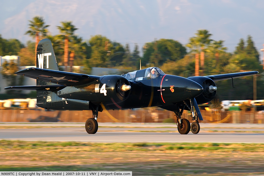 N909TC, 1945 Grumman F7F-3P Tigercat C/N 80425, Grumman F7F-3P Tigercat NX909TC thundering down RWY 16R during a pattern work session.  What an awesome machine... I was so fortunate to see it and capture the moment.