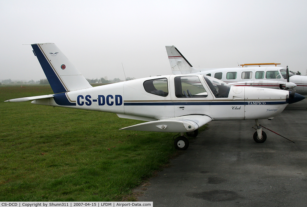 CS-DCD, Socata TB-9C Club Tampico Club C/N 1127, Socata TB10 parked in front of a maintenance hangar...