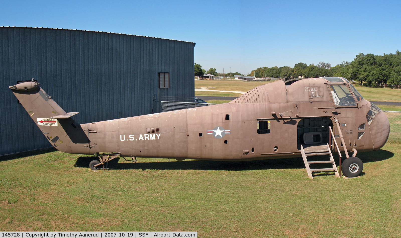 145728, Sikorsky UH-34E Seahorse C/N 58-896, Sikorsky H-34, Texas Air Museum, museum person said it was left behind by a company that moved to California, photo stitched from 2 images. BuNo 145728.  Being restored in Army colors. Was all white in 2001