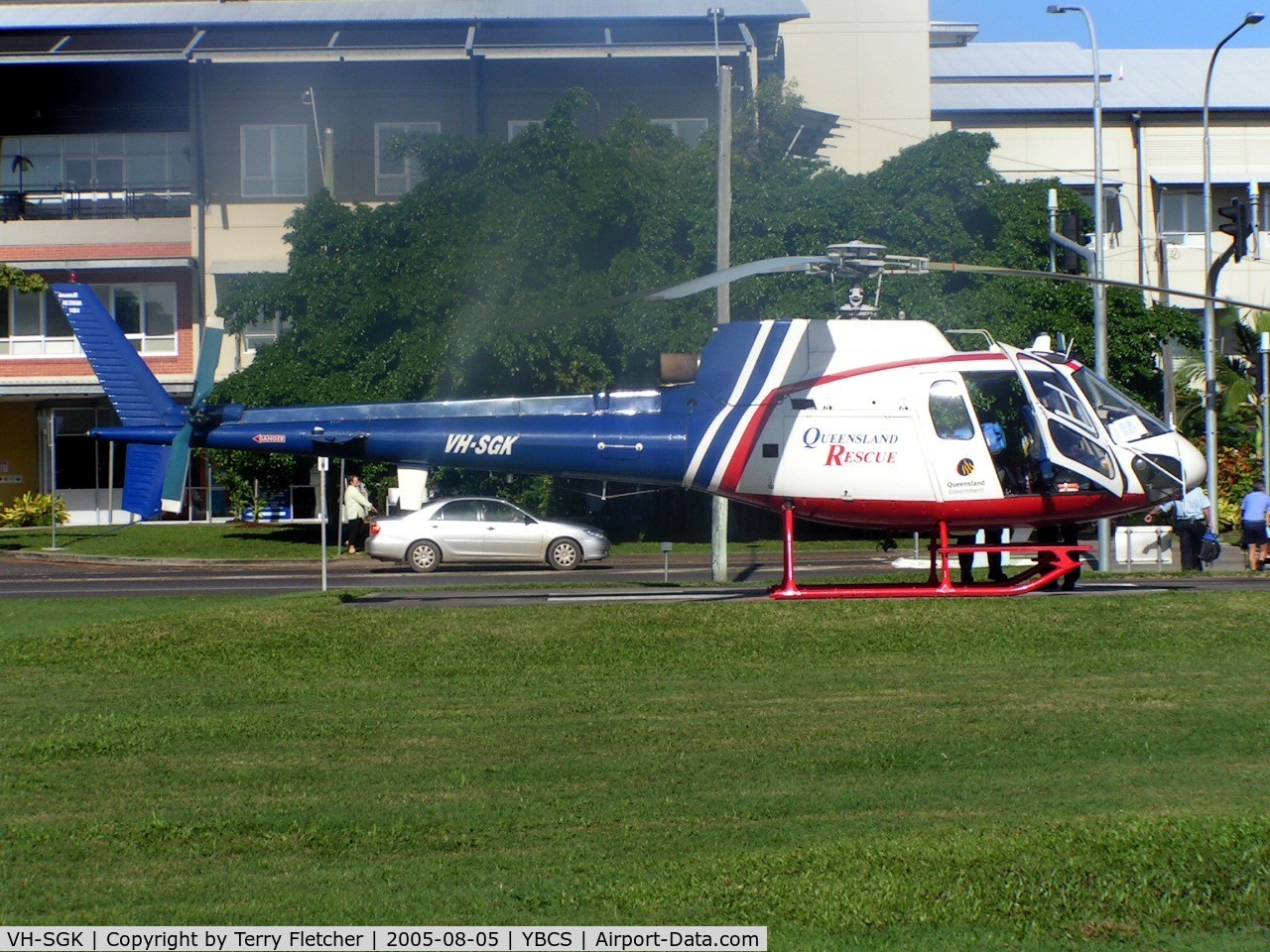 VH-SGK, 1981 Eurocopter AS-350BA Ecureuil C/N 1494, Ambulance Helicopter adjacent to Hospital on Cairns Promenade