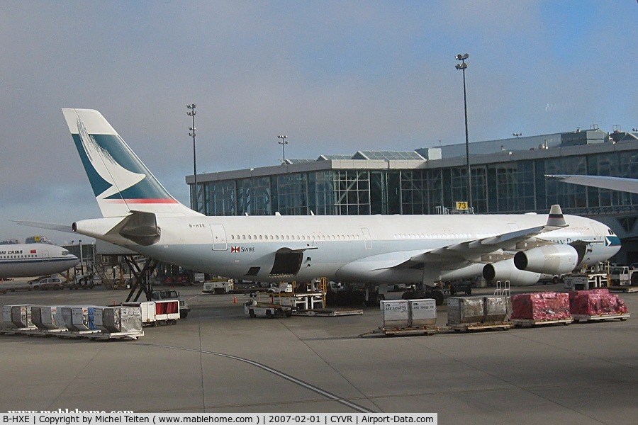 B-HXE, 1996 Airbus A340-313 C/N 157, Cathay Pacific at the Vancouver Main Terminal