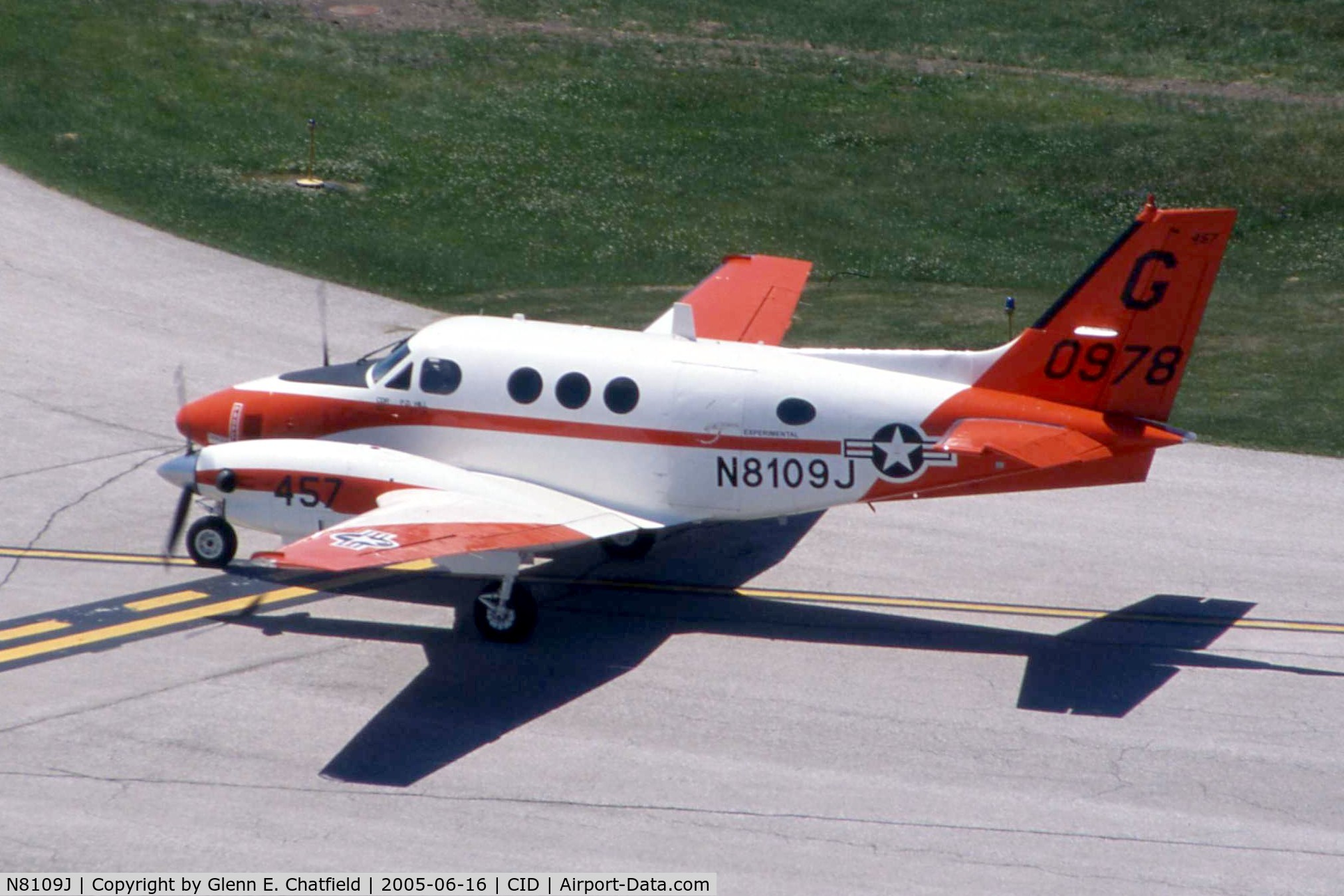 N8109J, 1978 Beech H90 (T-44A) C/N LL-30, T-44A 160978 taxiing by the control tower