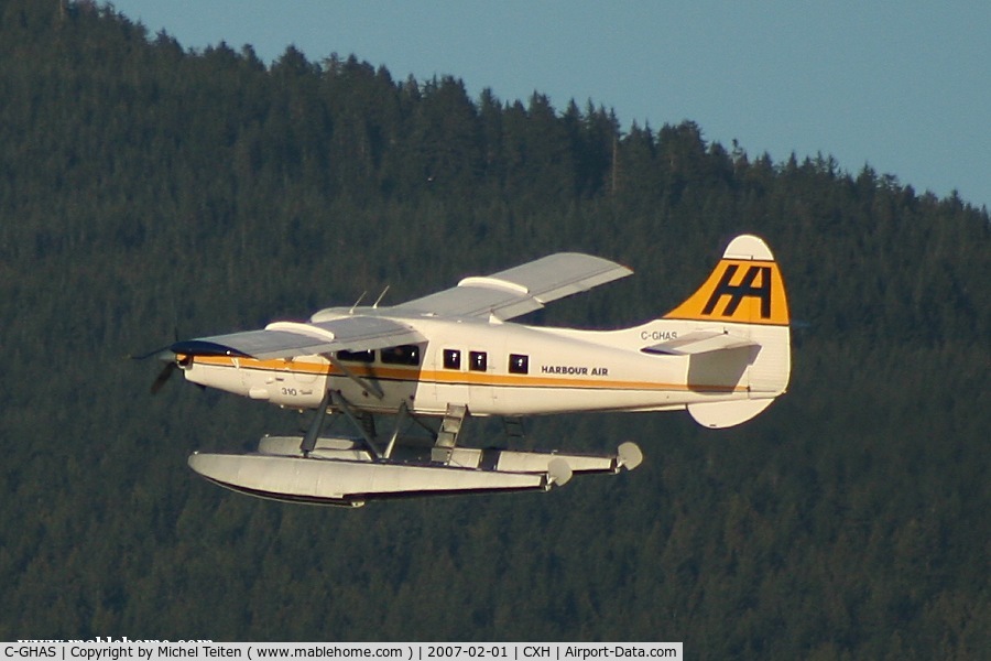 C-GHAS, 1958 De Havilland Canada DHC-3 Otter C/N 284, Seen over Grouse Mountain after take-off from Coal Harbour