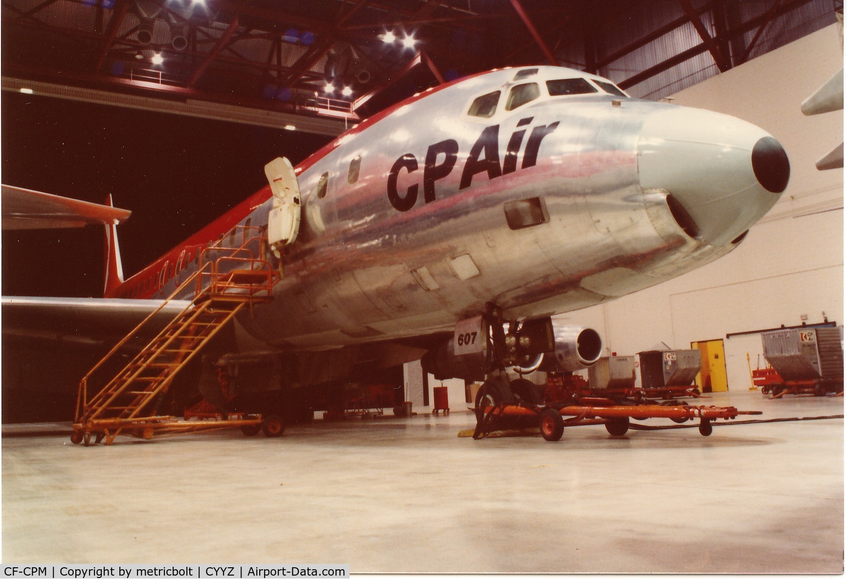 CF-CPM, 1966 Douglas DC-8-53 C/N 45809, Overnighting in the CP Air hangar,Toronto,early 80s