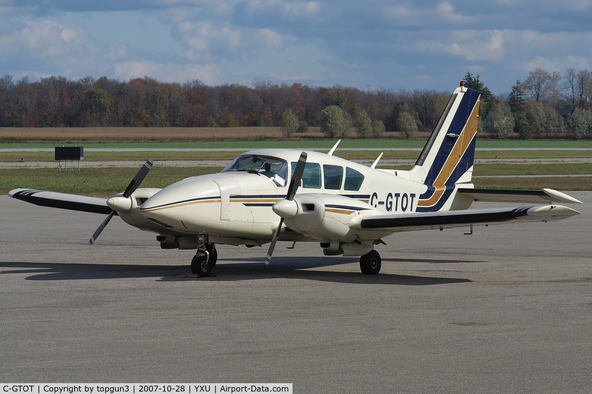 C-GTOT, 1977 Piper PA-23-250 C/N 27-7754121, Parked at ESSO ramp.