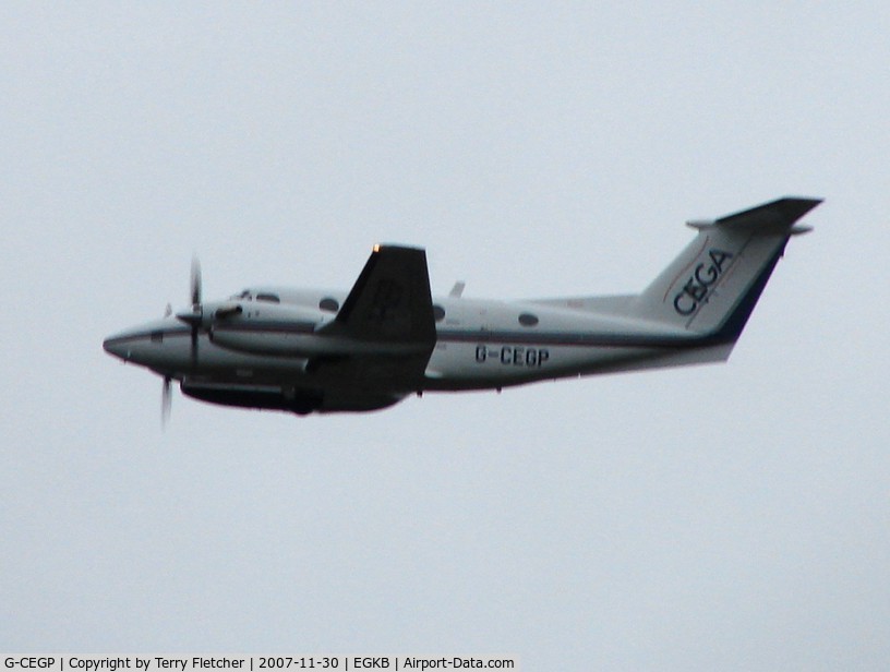 G-CEGP, 1980 Beech 200 Super King Air C/N BB-726, CEGA's Beech 200 climbs out of Biggin Hill on a very murky afternoon