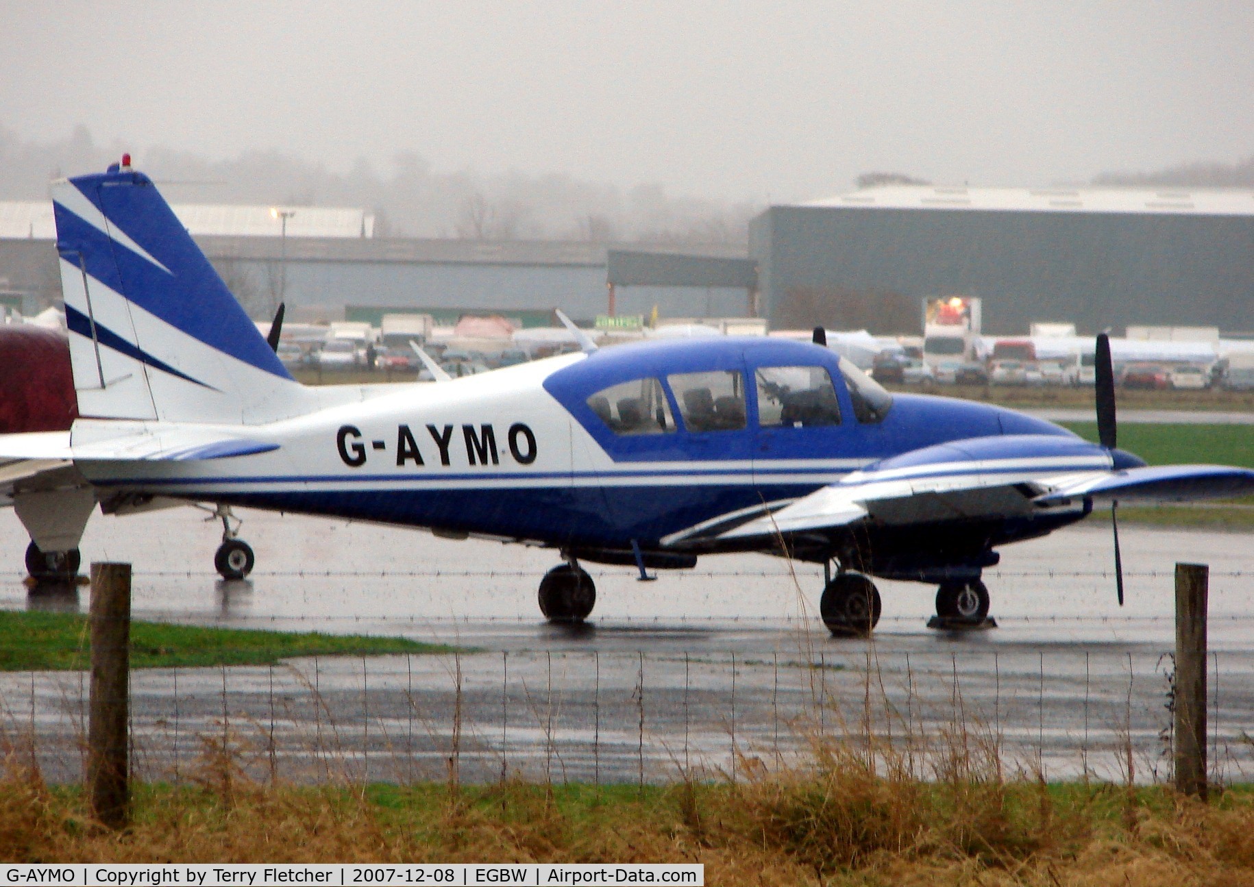 G-AYMO, 1965 Piper PA-23-250 Aztec C/N 27-2995, Pa-23-250 on a wet morning at Wellesbourne