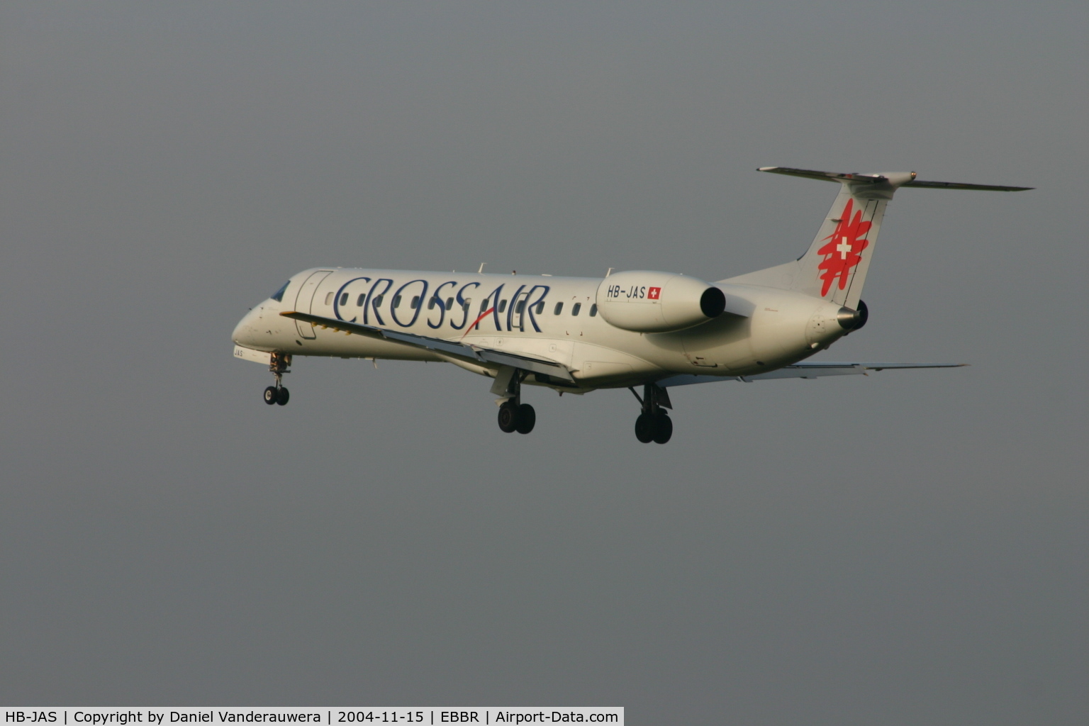 HB-JAS, 2002 Embraer EMB-145LU (ERJ-145LU) C/N 145559, several seconds before touching rwy 25L