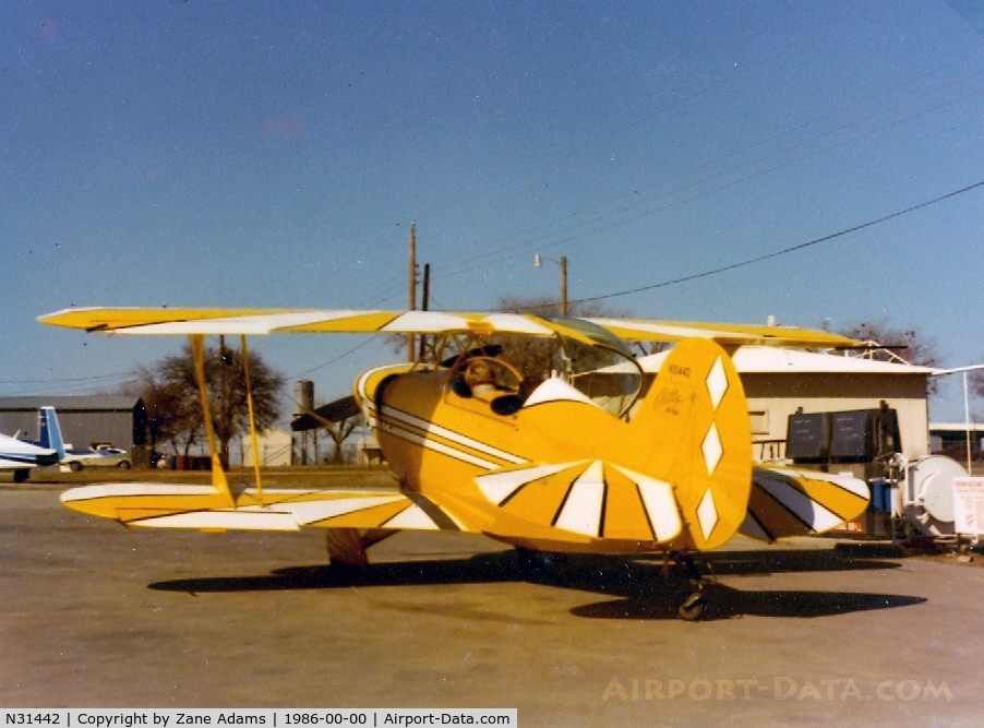 N31442, Taylorcraft BC-65 C/N 1126, PITTS S-2A Unknown airport and date...1986 on photo?