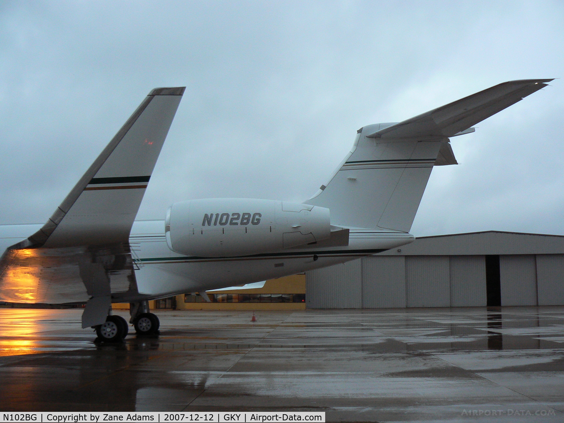 N102BG, 2004 Gulfstream Aerospace GV-SP (G550) C/N 5038, On the ramp at Arlington Municipal...in the cold rain