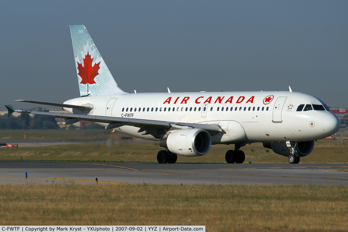 C-FWTF, 2003 Airbus A319-112 C/N 1963, Taxiing for departure via RWY23.