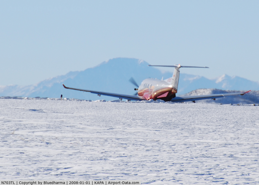 N703TL, 2006 Pilatus PC-12/47 C/N 703, Takeoff on 17L with Pikes Peak in the background.