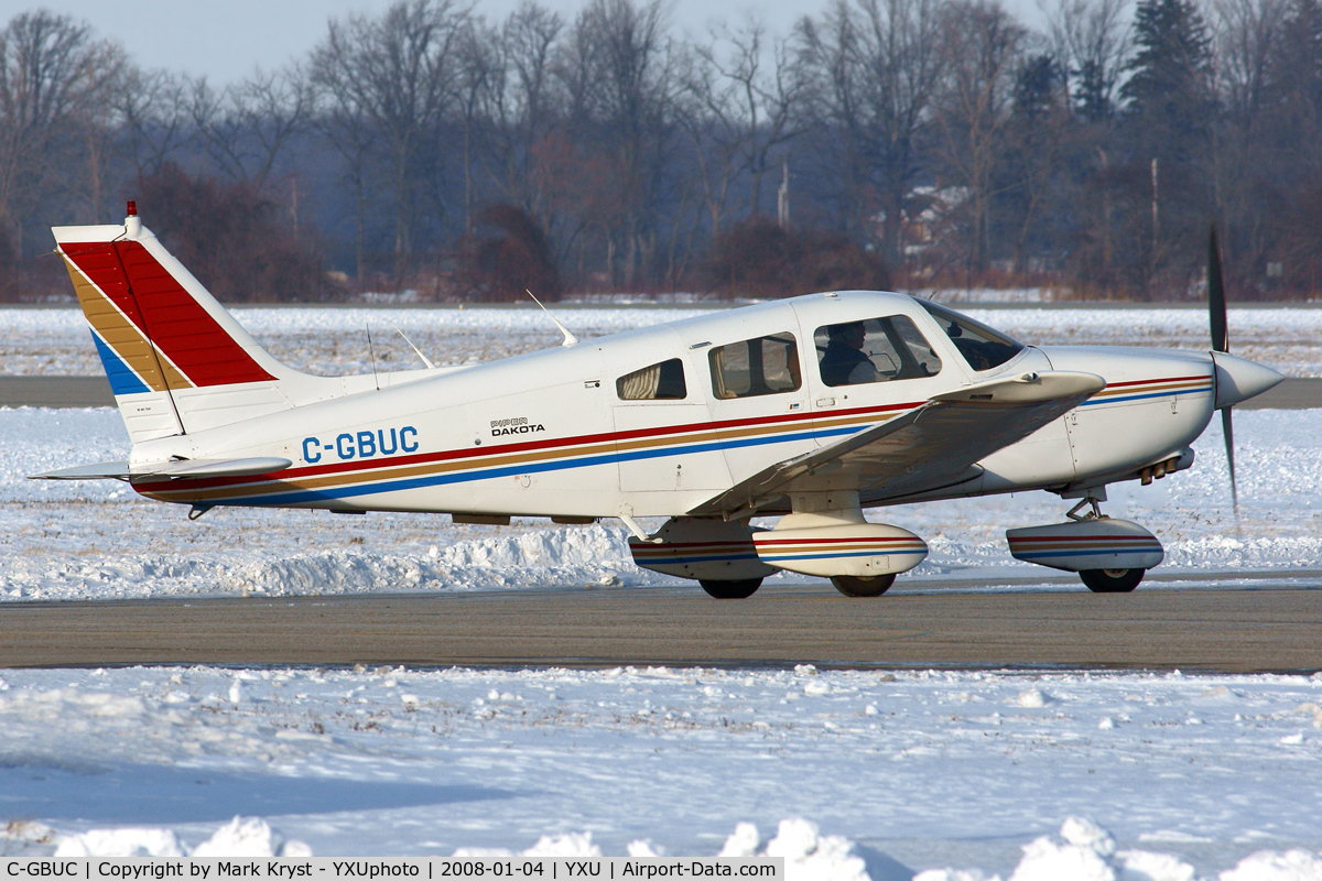 C-GBUC, 1980 Piper PA-28-236 Dakota C/N 28-8011117, Taxiing on Alpha.