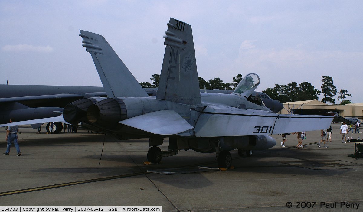 164703, McDonnell Douglas F/A-18C Hornet C/N 1142, For such a short hop, no need for external fuel tanks.  If you took a lokk at them, they had been converted to cargo pods.