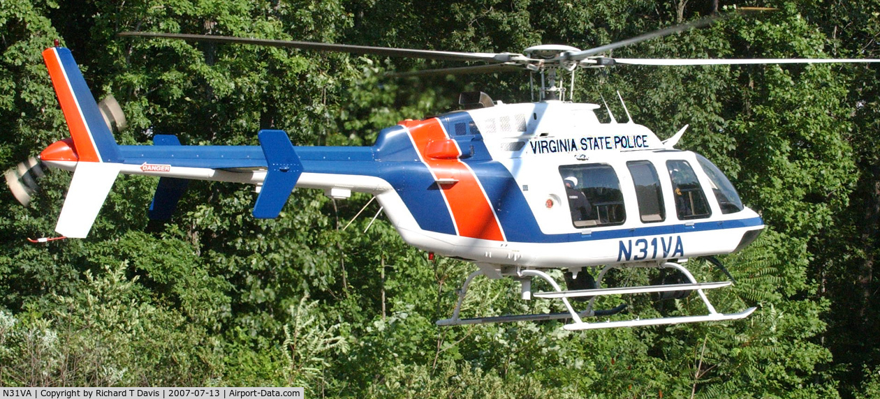 N31VA, 2000 Bell 407 C/N 53465, 2000 Bell 407 Virginia State Police leaving wreck scene along the Danville Va. Expressway with patients aboard  enroute to hospital.