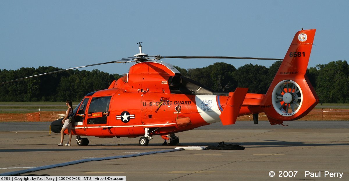 6581, 1988 Aerospatiale HH-65C Dolphin C/N 6279, Late afternoon sun turning up the intensity on the Orange