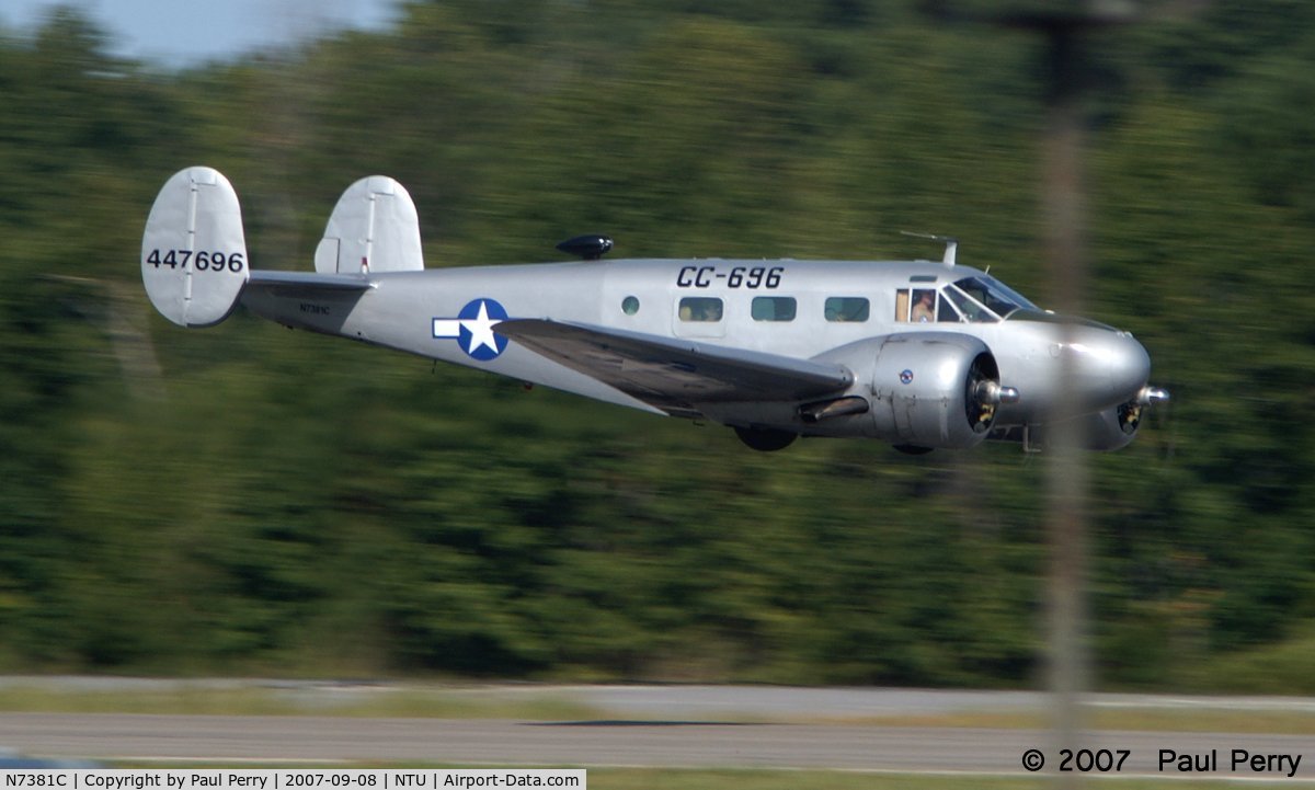 N7381C, 1944 Beech C18S C/N 8104, Streaking in over the runway