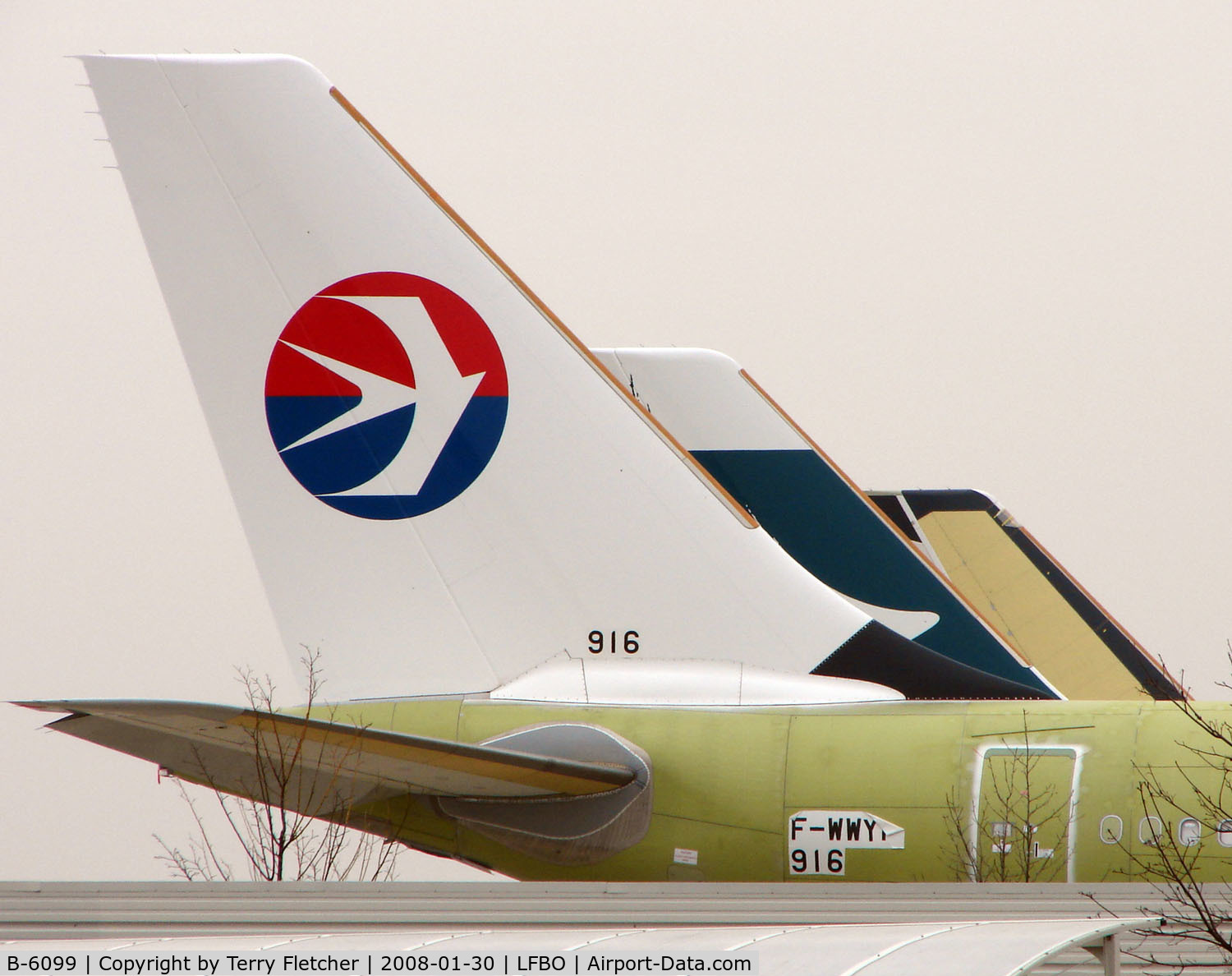 B-6099, 2008 Airbus A330-243 C/N 916, Newly built A330 in green primer with just its tail in China Eastern colours