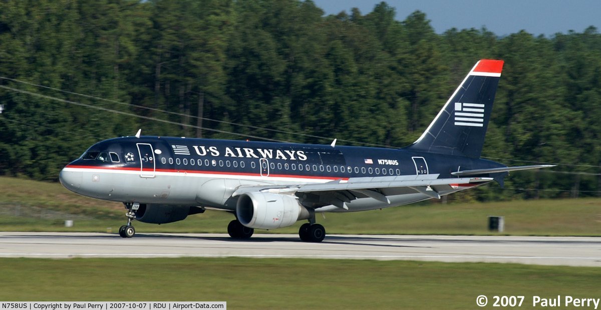 N758US, 2000 Airbus A319-112 C/N 1348, Touching down, not too much weight on the nosewheel yet