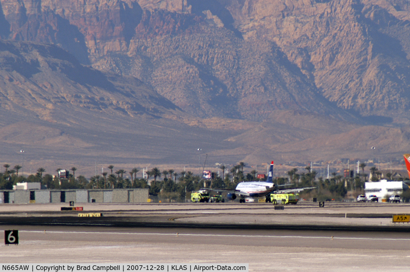 N665AW, 2001 Airbus A320-232 C/N 1644, US Airways / 2001 Airbus Industrie A320-232 / This landing prompted all McCarran's Emergency Vehicles to stand-by. No mishap occured.
