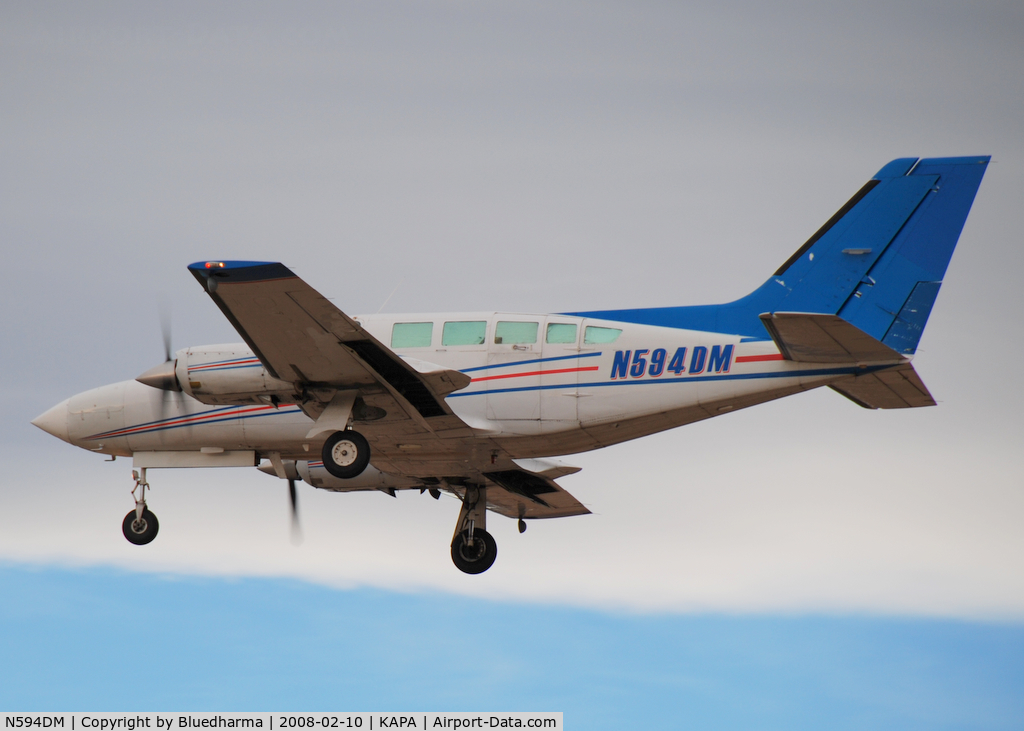 N594DM, 1979 Cessna 402C C/N 402C0068, Approach to 17L.