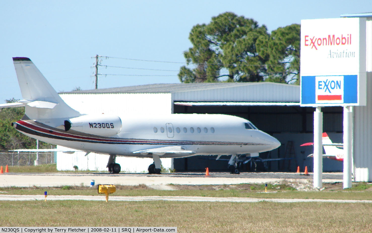 N230QS, 2005 Dassault Falcon 2000EX C/N 59, Executive DA2000EX shimmers in the midday Sarasota heat