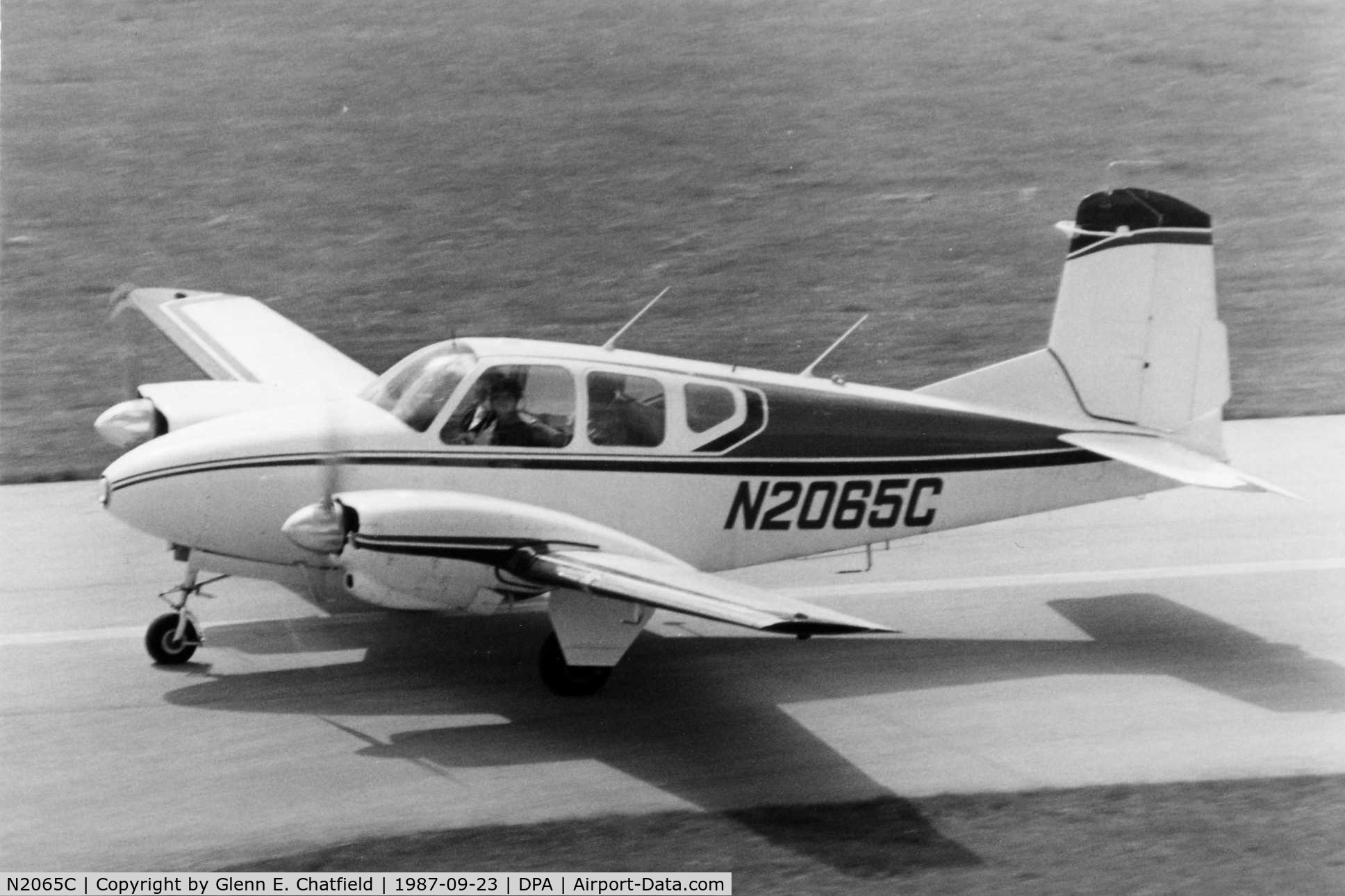 N2065C, 1959 Beech B95 Travel Air C/N TD-208, Photo taken for aircraft recognition training.  Taxiing by the control tower.